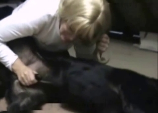 Black dog and a hot blonde have nasty bestiality