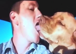 Zoophile porn shows a guy making out with a dog